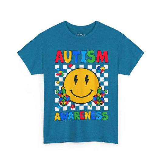 Blue t-shirt with autism awareness design featuring a smiley face and colorful elements on a white background.
